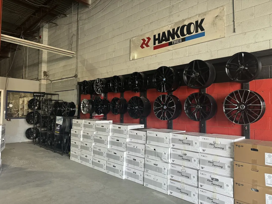 Wall of alloy wheels in stock at Taylor Tire, Markham